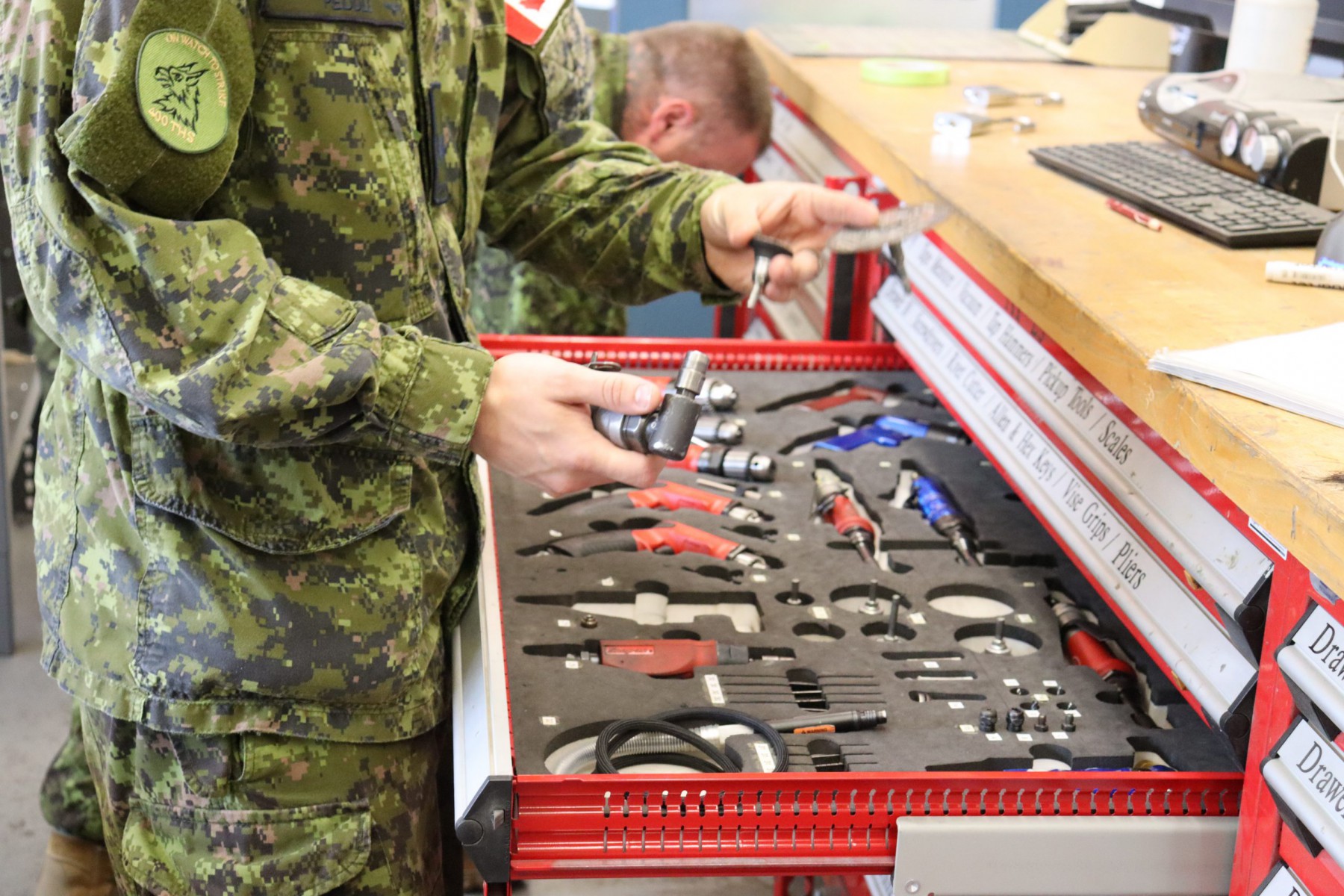 Cpl Peddle displaying the tools used to help craft the blade of the rapier (Caleb Hooper/Borden Citizen)