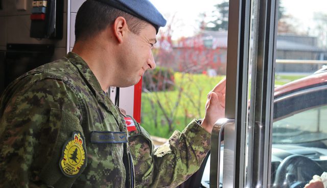 Colonel Jonathan Michaud, Commander CFB Borden, serves a customer through the drive-thru window at the Angus McDonald’s on McHappy Day. The Borden Family Resource Centre received a $1,500 donation from McHappy Day fundraising. (Photo by: Emily Nakeff, Borden